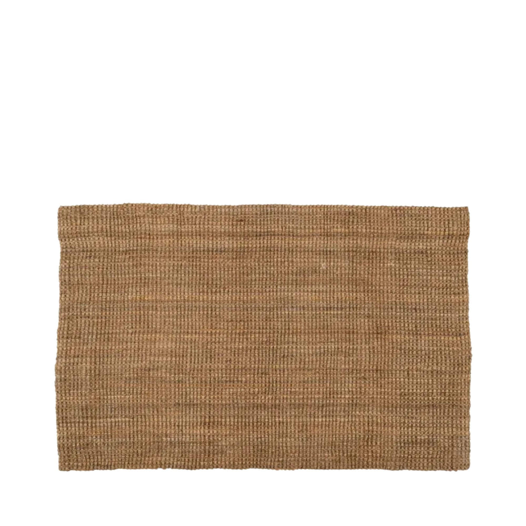 Front view of the Fati natural jute rug showing its rectangular shape and warm handwoven texture