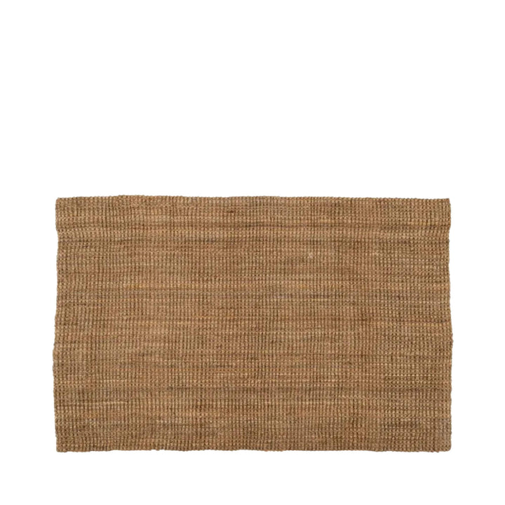 Front view of the Fati natural jute rug showing its rectangular shape and warm handwoven texture