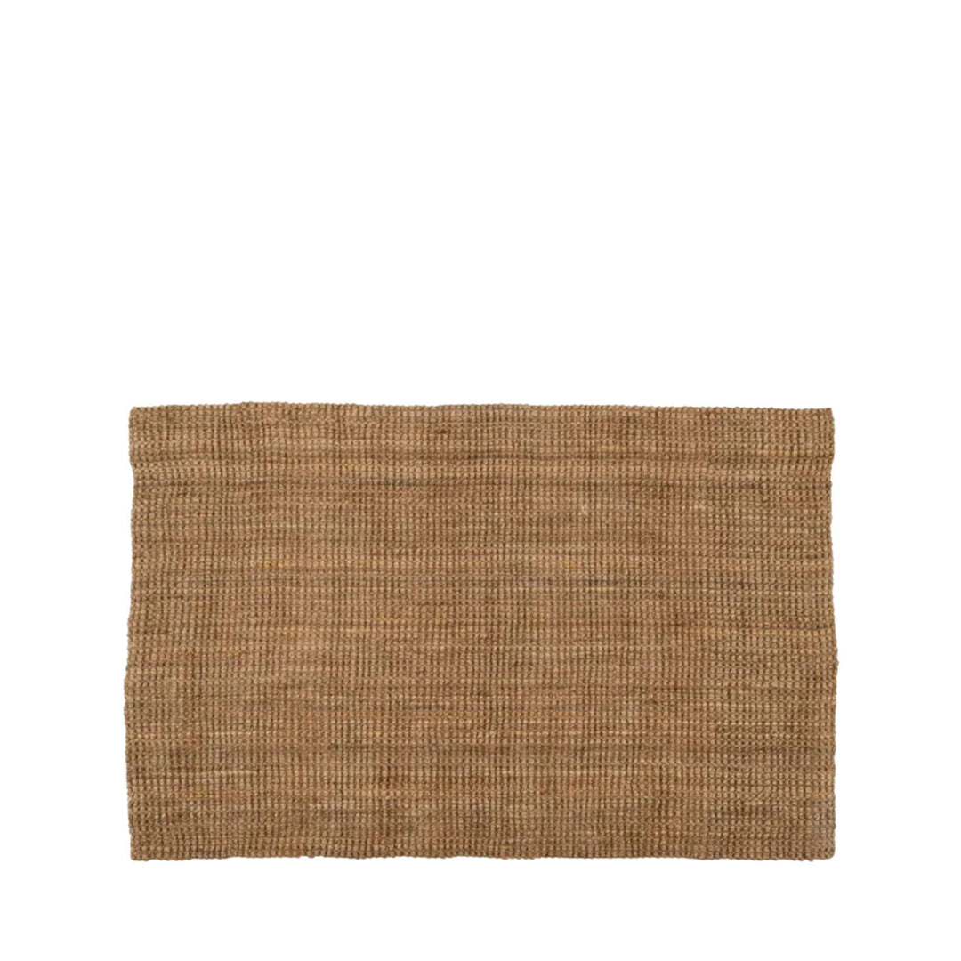 Smaller size of the Fati natural jute rug shown on a white background