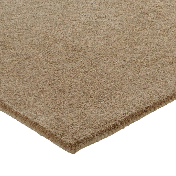 Close-up of the rug texture of Khaki Figari Rug showing the soft wool surface.