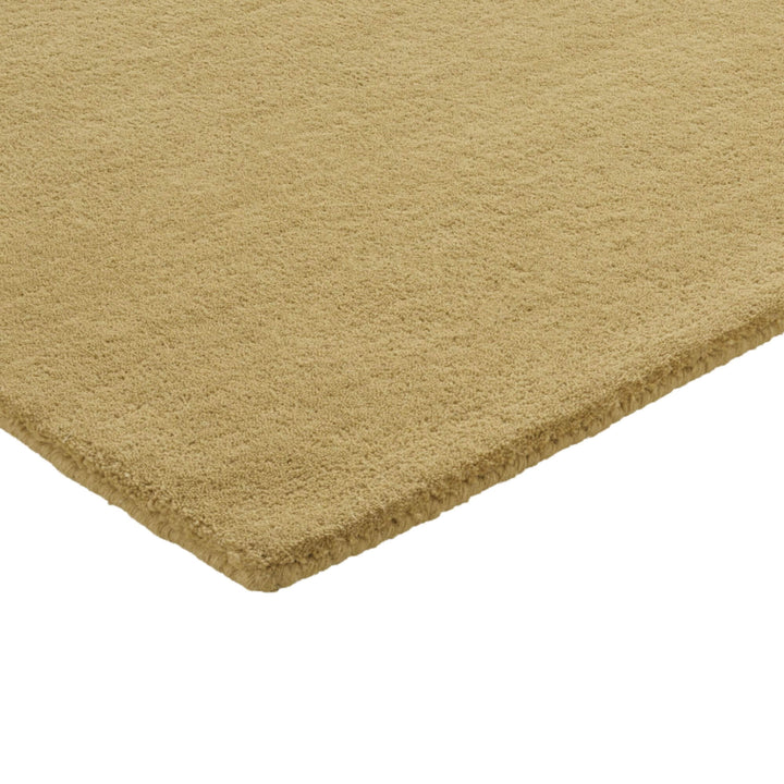 Close-up of the rug texture of Gold Figari Rug showing the soft wool surface.