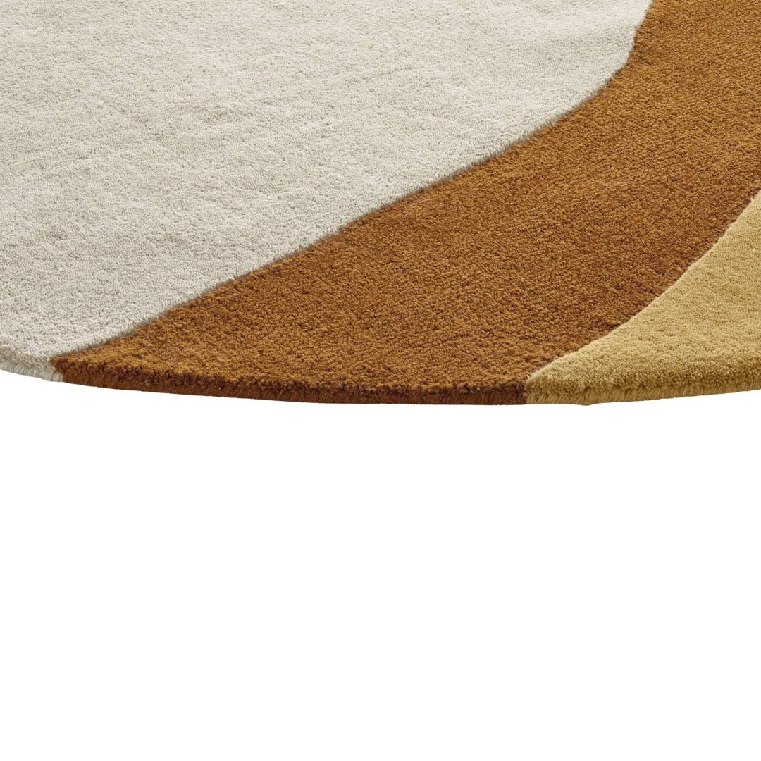 Close-up of the rug texture of Gold Figari Rug showing the soft wool surface.