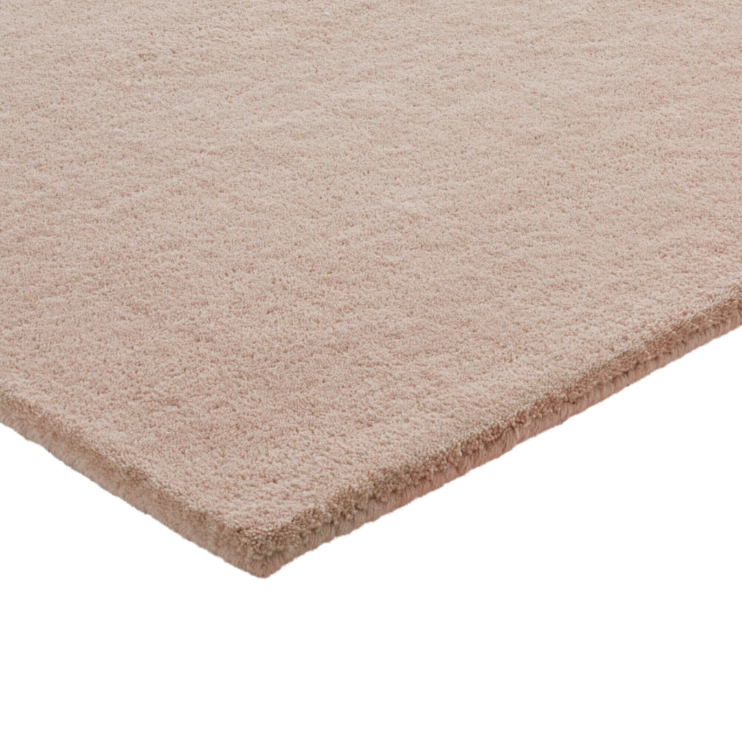 Close-up of the rug texture of Blush Figari Rug showing the soft wool surface.