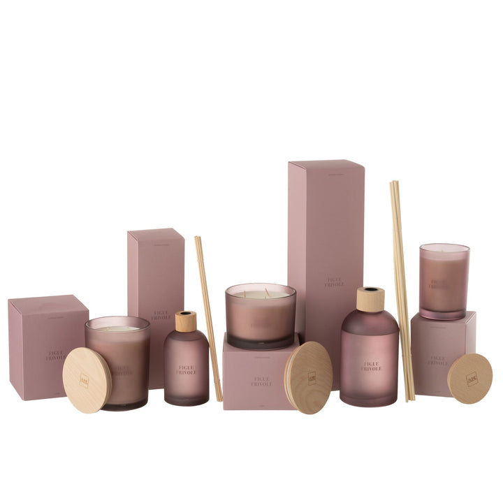 Figue Frivole candle collection arranged with diffusers and accessories.