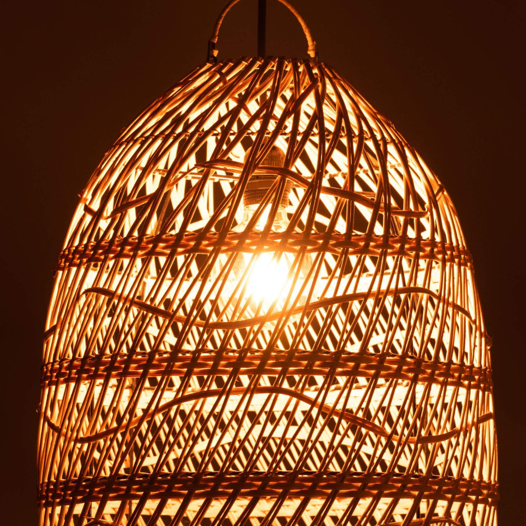 Fiji ceiling lamp lit at night creating warm patterned glow