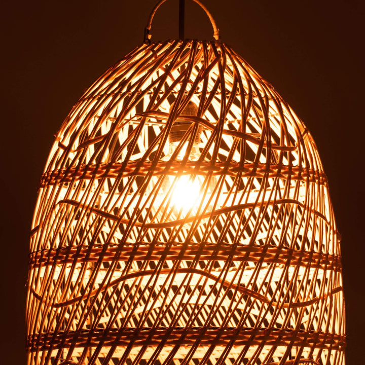 Fiji ceiling lamp lit at night creating warm patterned glow