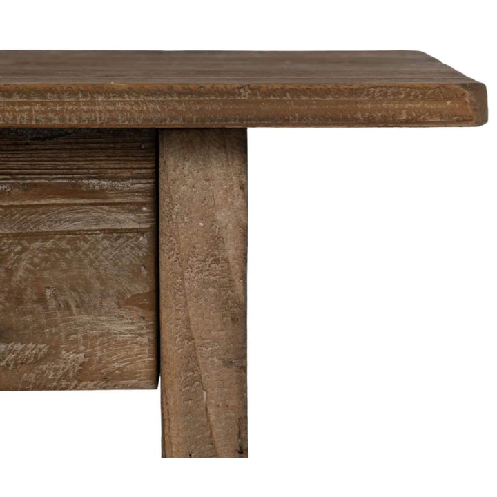 Side detail view of console table corner showing wood texture and joinery