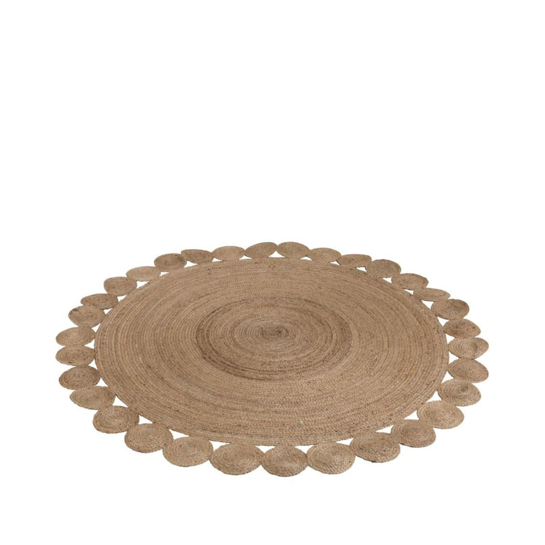 Front view of the Flor Round Jute Rug with circular shape and scalloped edge in natural jute.