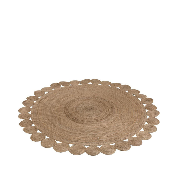 Front view of the Flor Round Jute Rug with circular shape and scalloped edge in natural jute.