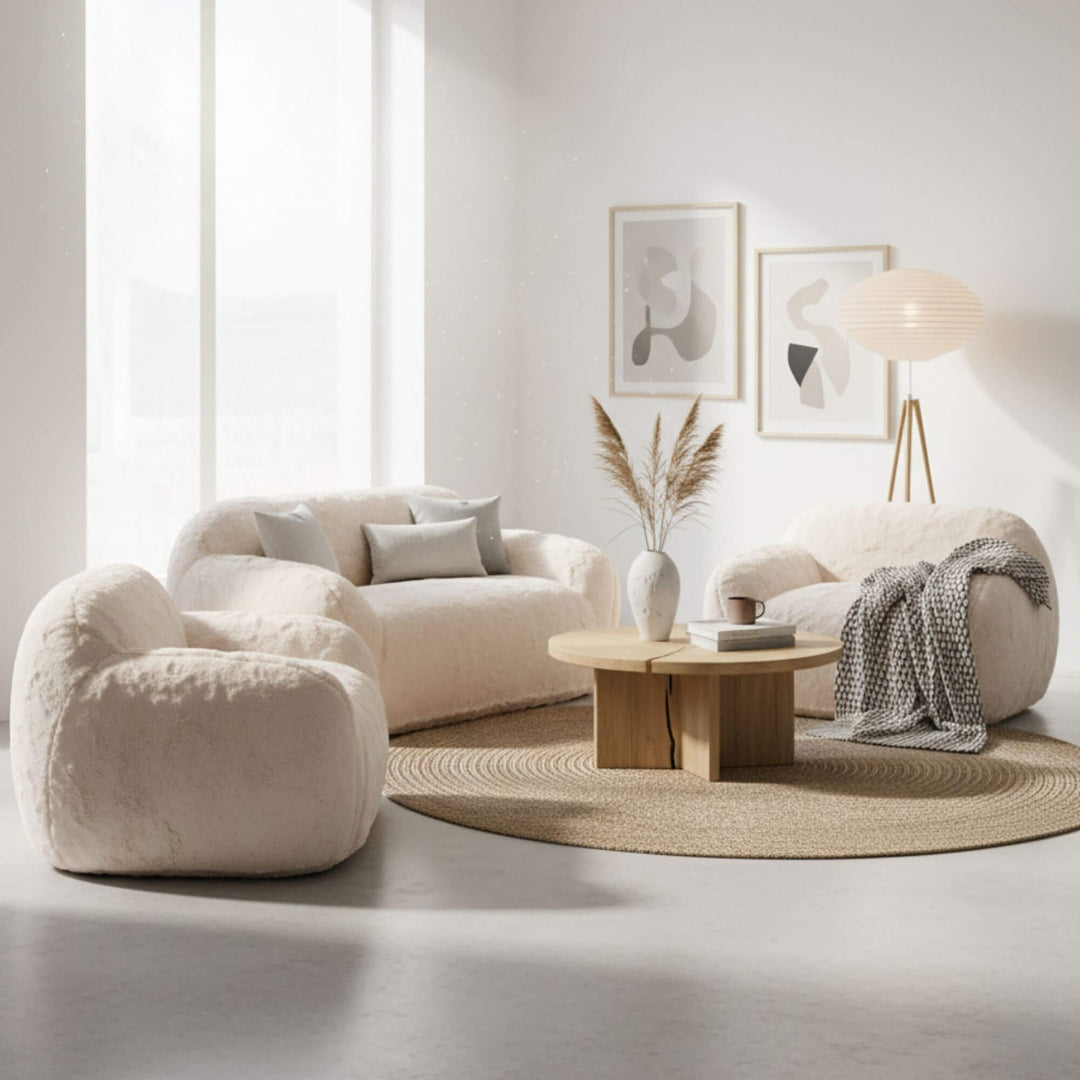 Fluff Sofa creme shown in a bright modern living room with plush texture.