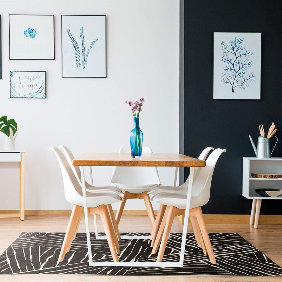 Black and white Freek rug showing sharp geometric contrast.