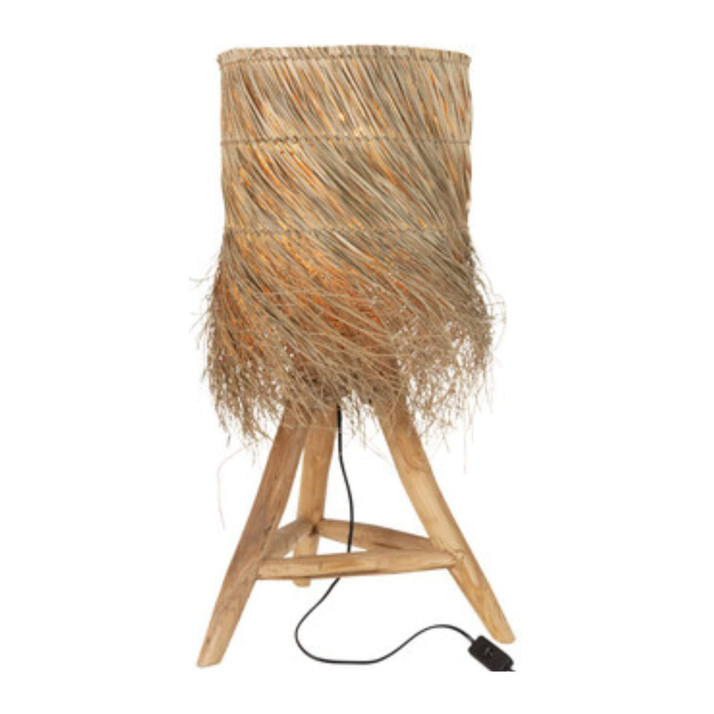 Fury table lamp illuminated, showing warm patterned light through natural fibers.