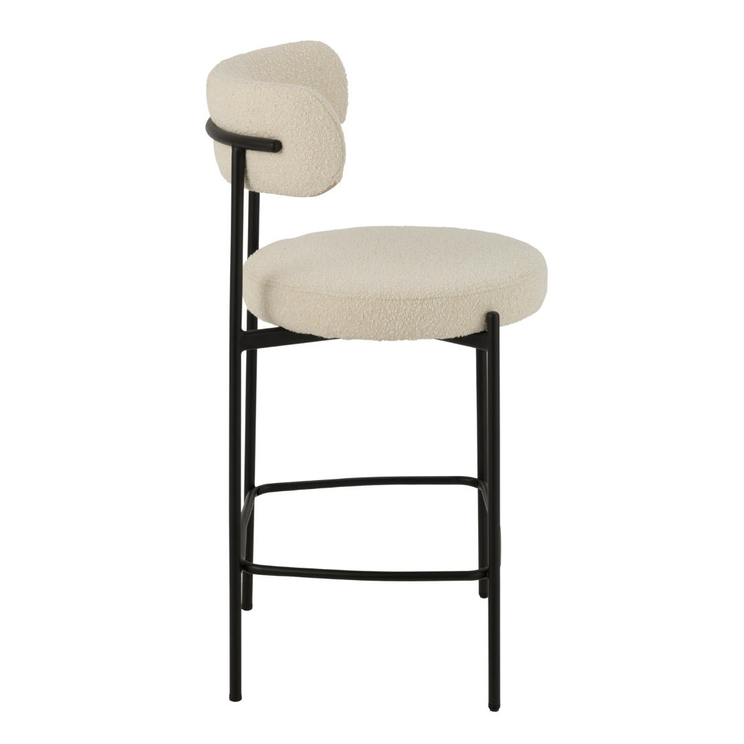 Side view of Gelia Bar Stool showing the curved backrest and slim metal legs.