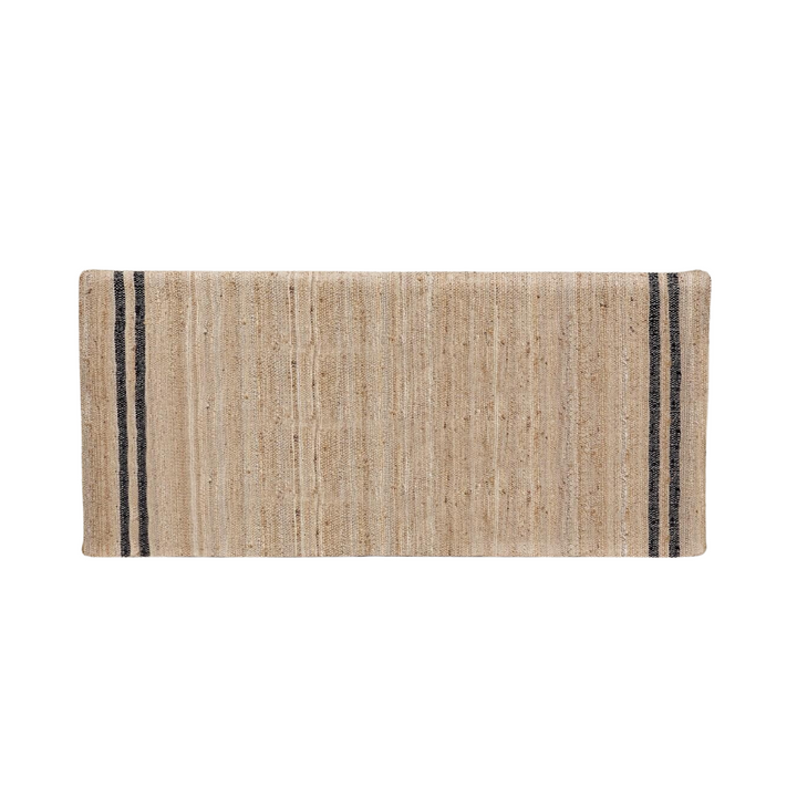 Front view of Ghana Jute Headboard showcasing its natural woven texture and dark stripe details.