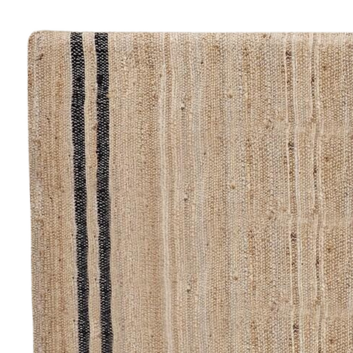 Close-up detail of the Ghana Jute Headboard highlighting the handcrafted jute weave.