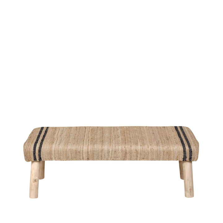 Front view of the Ghana Jute Bench with a natural woven jute seat, black stripe detail, and light wooden legs