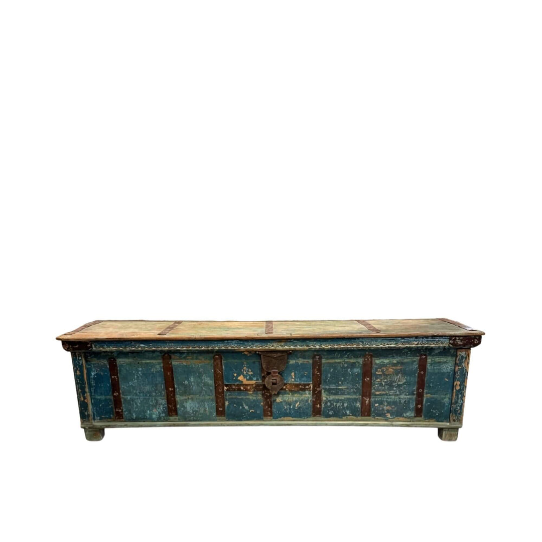 Front view of Giang blue trunk highlighting its distressed finish and metal detailing.