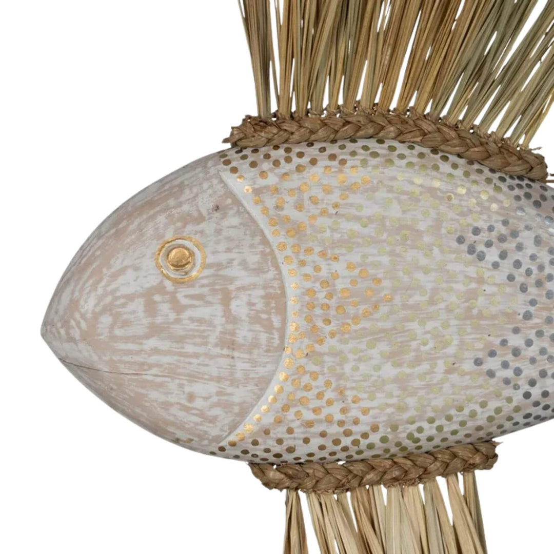 Close-up of Gitega Decorative Fish showing carved wood texture and woven seagrass fins.

