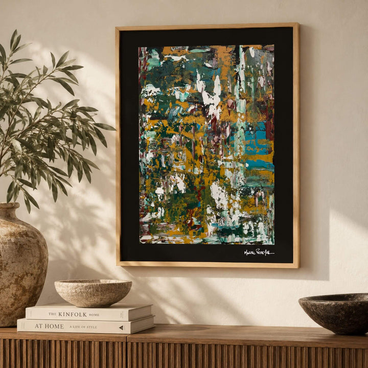 Golden Wilderness painting by Manuel Pereyra displayed above a wooden console in a warm contemporary interior