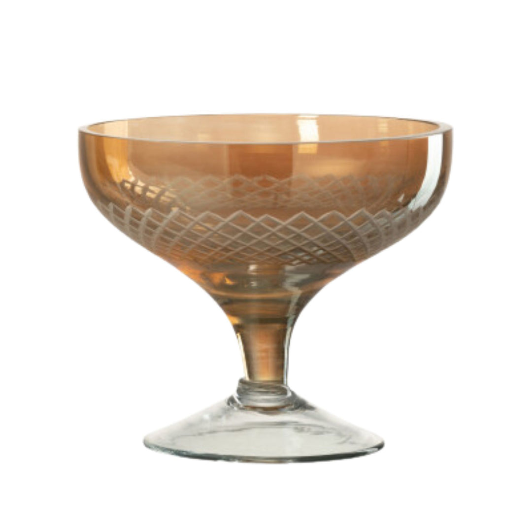 Gold Sousse Glass Cup with footed base and etched geometric detailing.