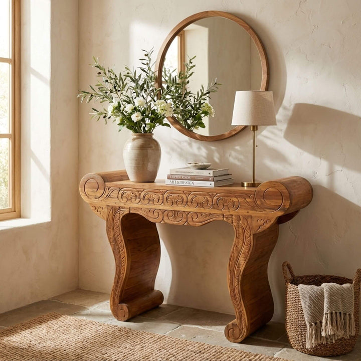 Styled interior view of the Gopala console table placed beneath a round mirror in a warm, natural setting.