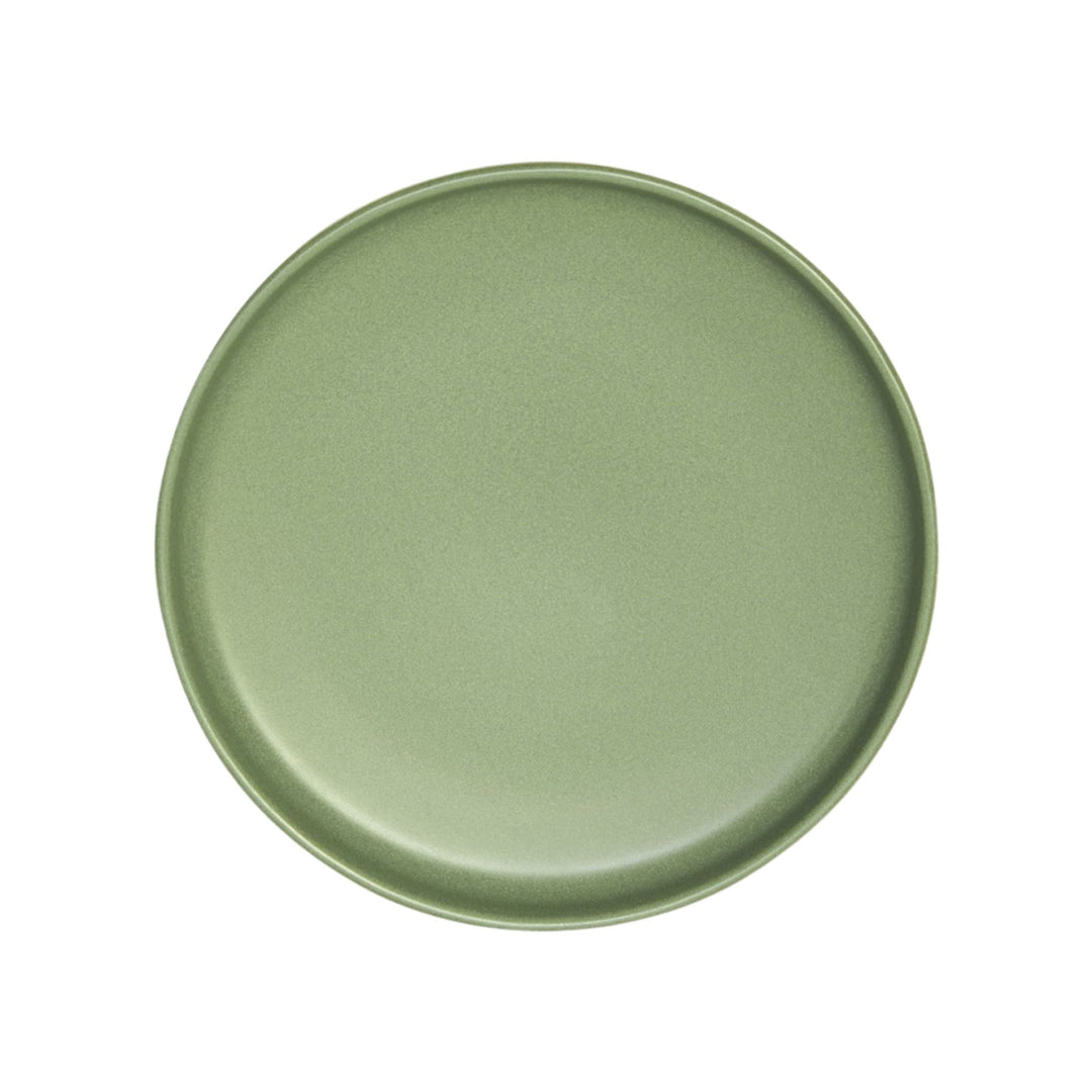 Top view of green ceramic plate with smooth minimalist finish.
