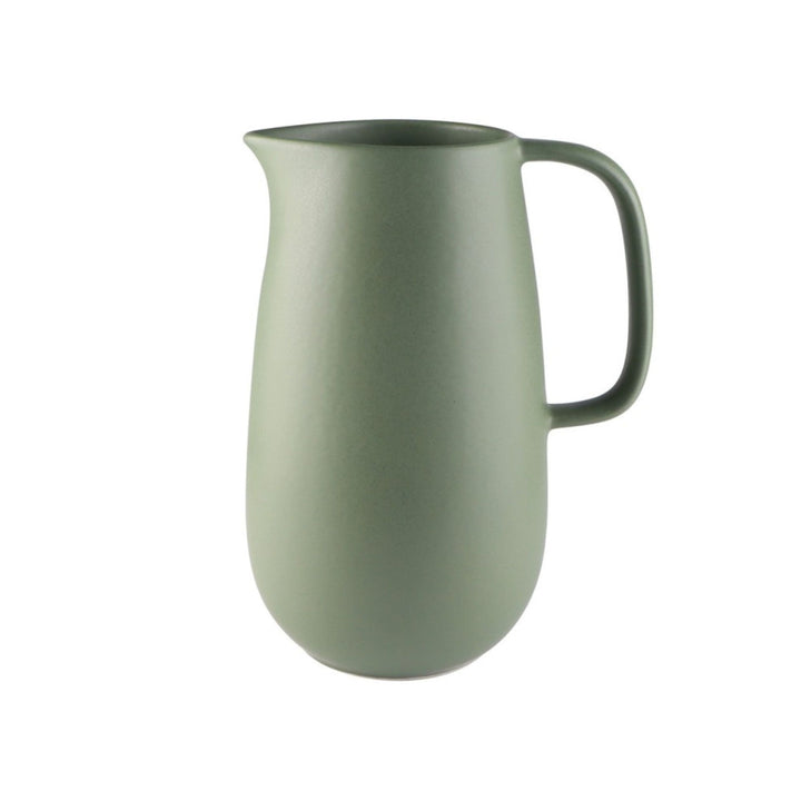 Green ceramic pitcher with clean lines from the Amande tableware series.