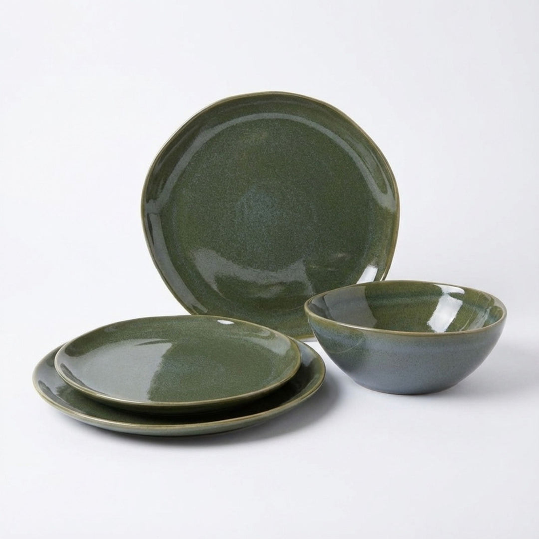 Green Symphony ceramic tableware set with plates and bowl in soft green glaze.