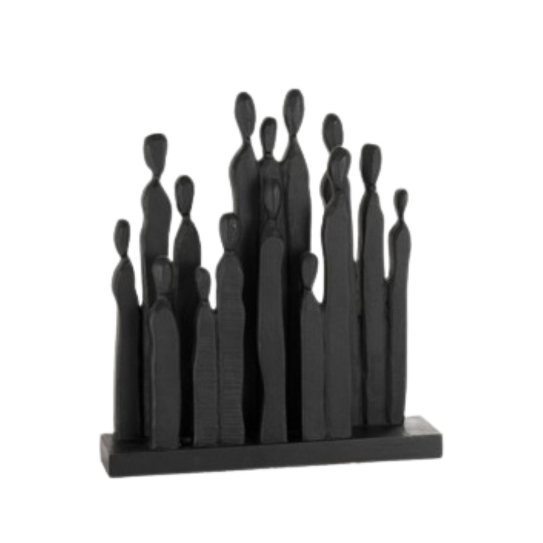 Front view of the Grupi wood figure showing a group of abstract human silhouettes in black.