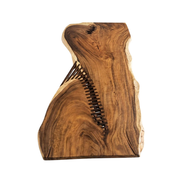 Close-up detail of the handcrafted butterfly joints embedded in the solid wood surface.