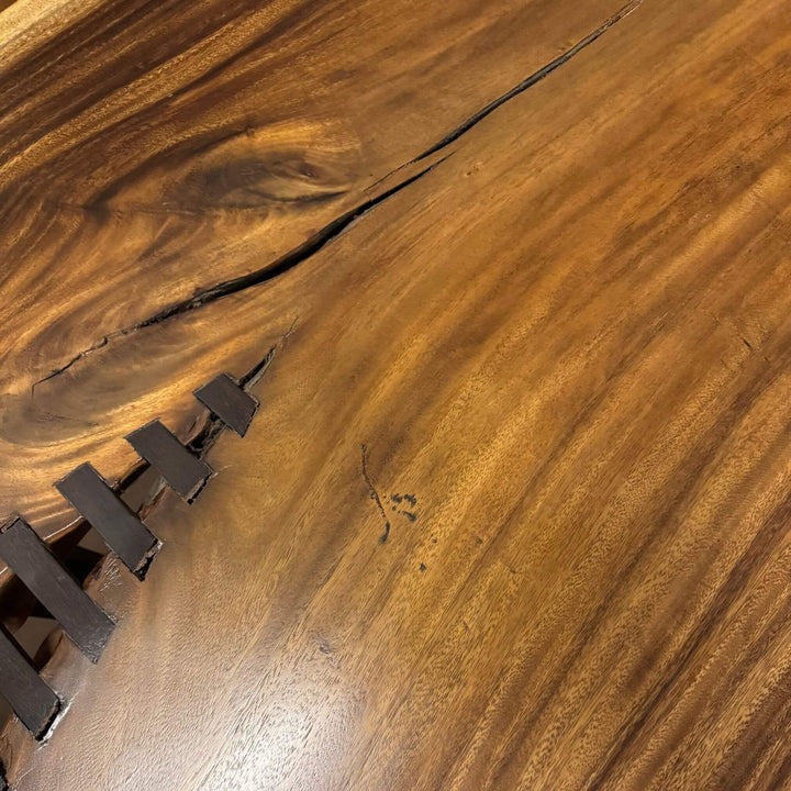 Close-up of natural suar wood grain detailing.