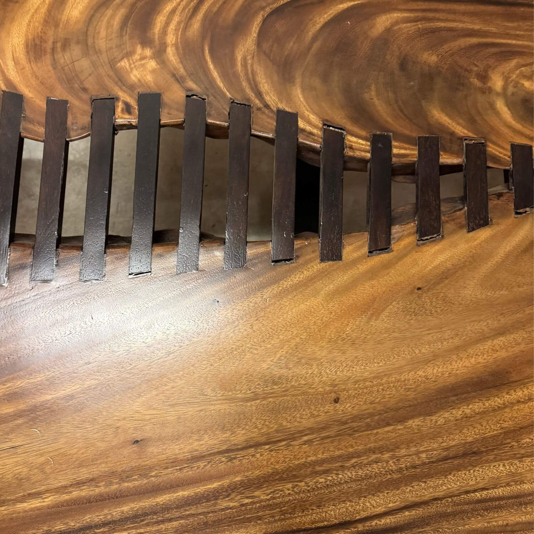 Close-up of butterfly joints on the Gunung Suar table top.