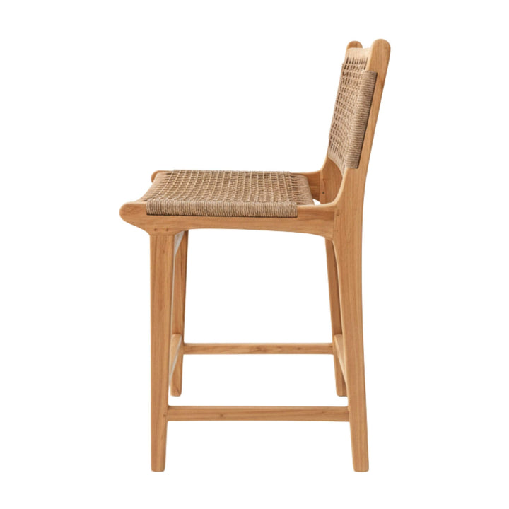 Side view showing the seat height and woven backrest.