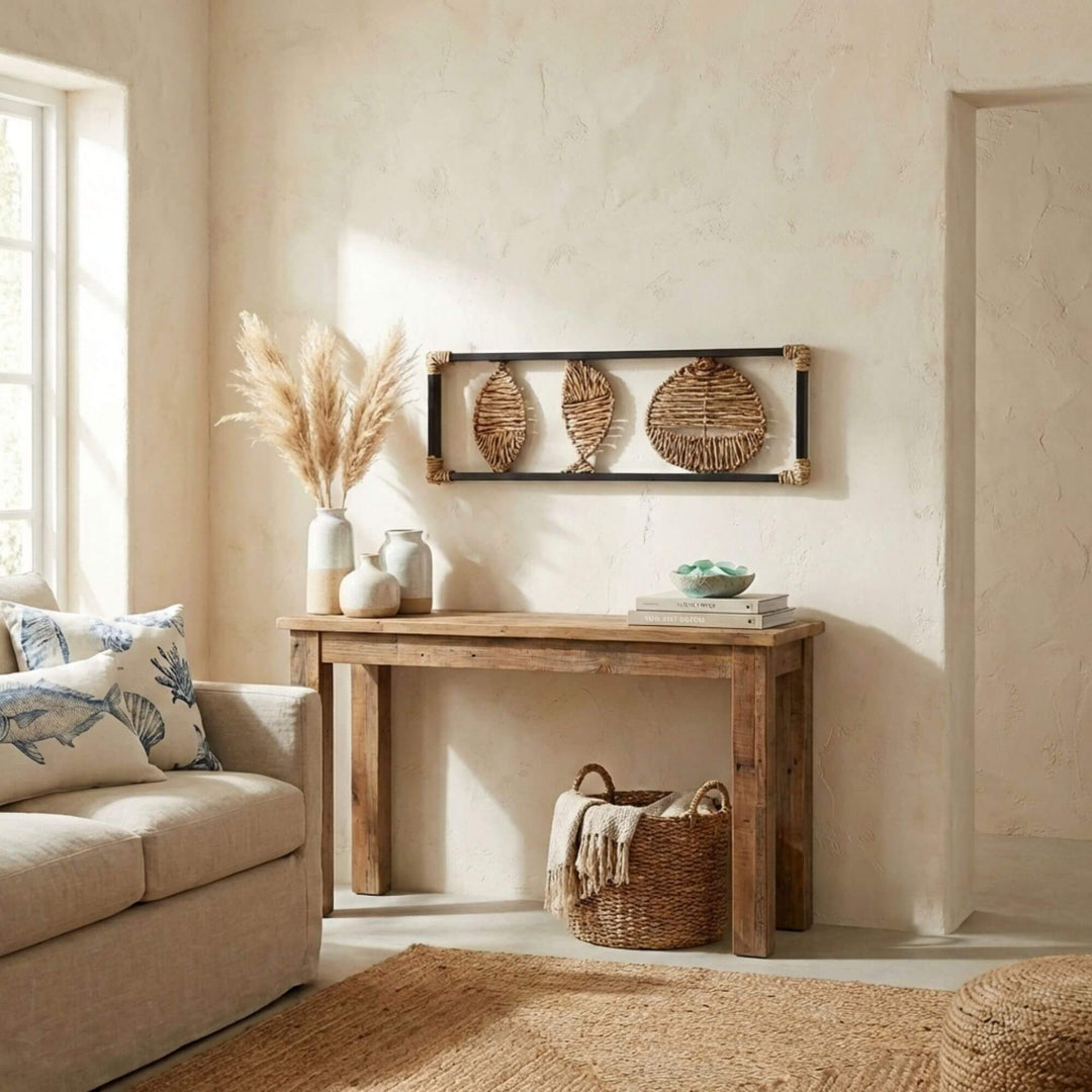 Nautical-themed living room with a wooden console table, sofa, and decorative hanagar wall deco.