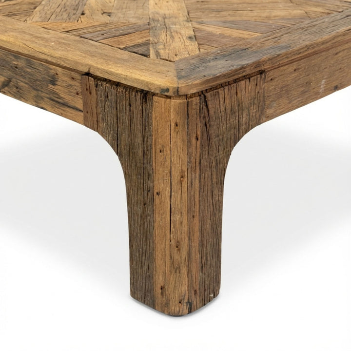 Detail view of Harat Coffee Table corner highlighting the reclaimed wood texture and craftsmanship.