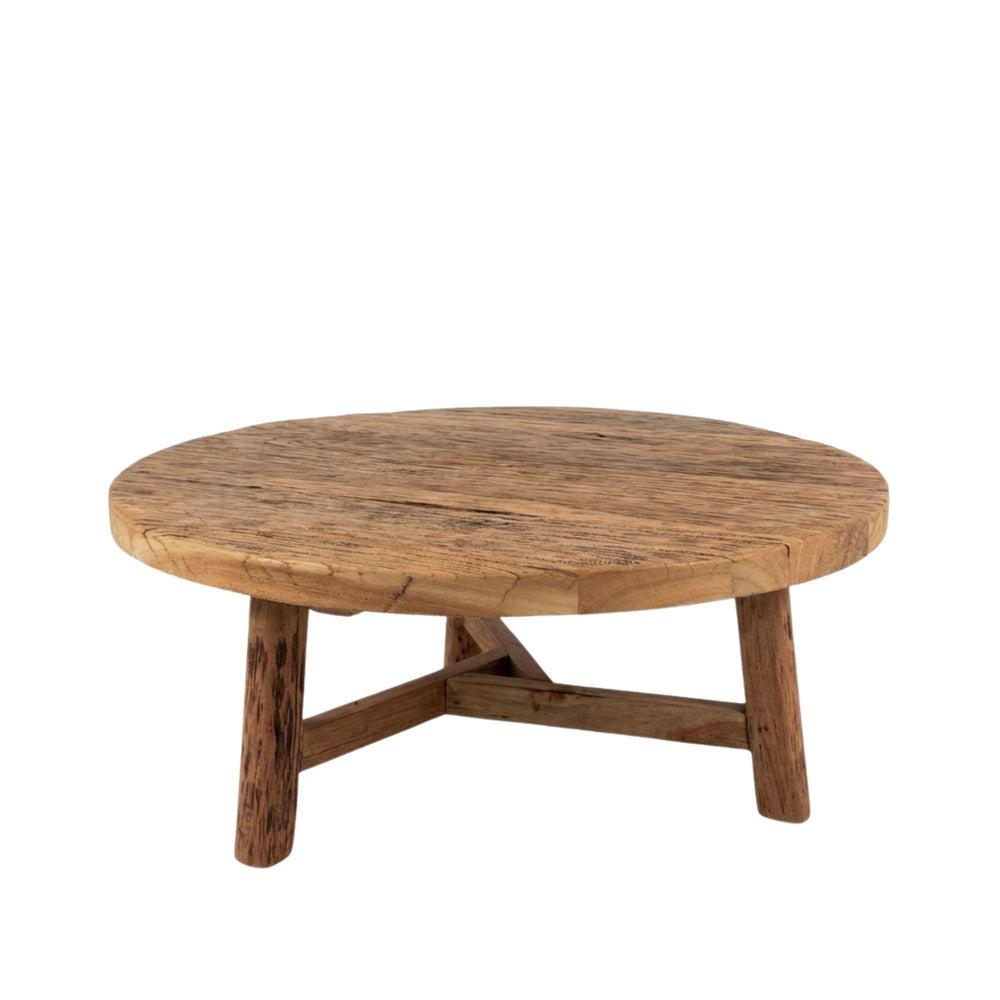 Front view of Harat Round Coffee Table made from reclaimed wood with a rustic round tabletop.