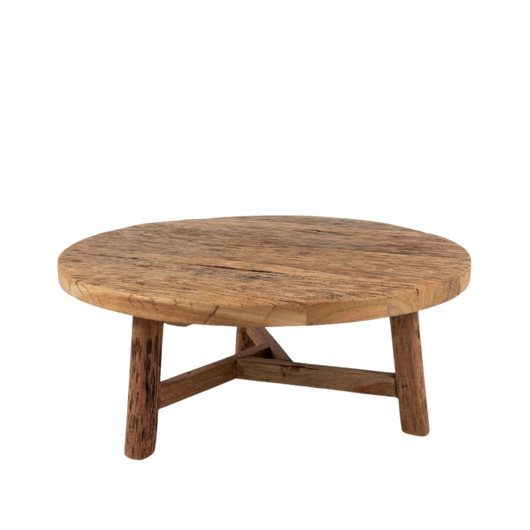 Front view of Harat Round Coffee Table made from reclaimed wood with a rustic round tabletop.