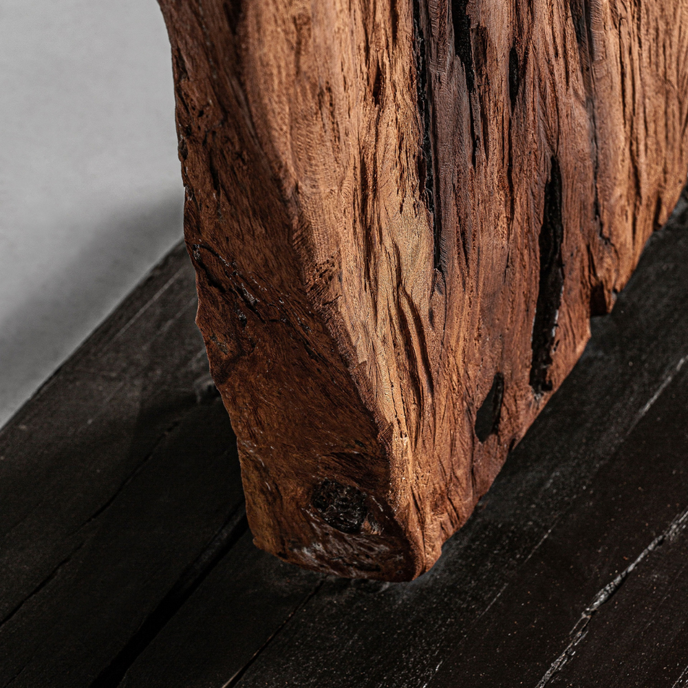 Close-up of the teak wood frame highlighting natural grain, cracks, and handcrafted texture.