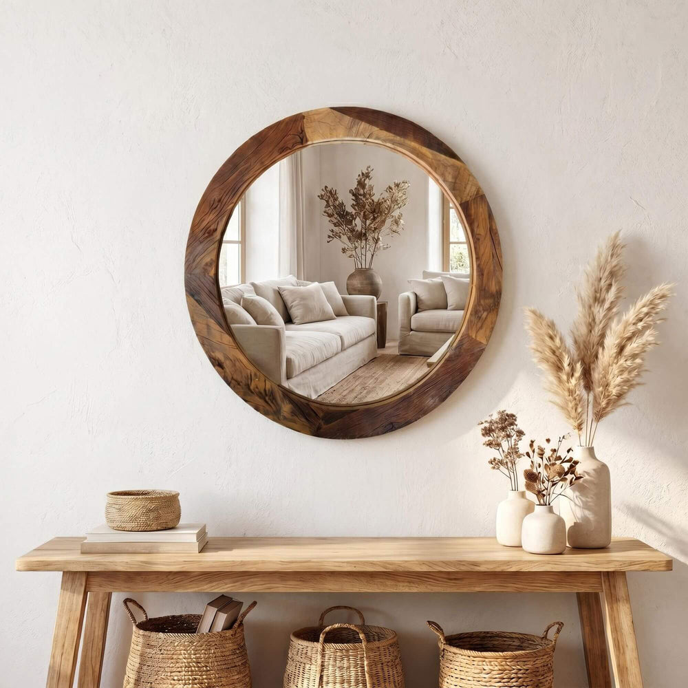 Styled interior setting featuring the Harat mirror displayed above a console in a warm natural space.