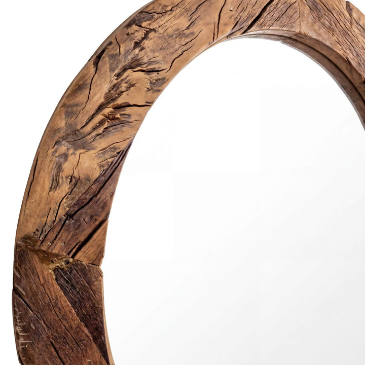 Close-up detail of the mirror frame showing the texture and tonal variation of the recycled wood.