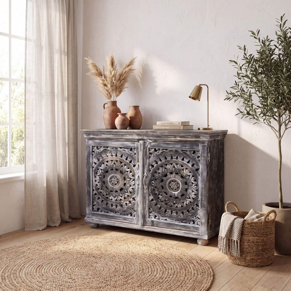 Hardiwar carved mango wood buffet styled in a warm neutral interior with natural decorative accents