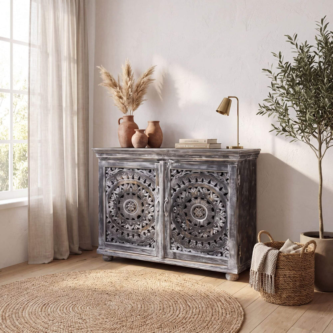 Hardiwar carved mango wood buffet styled in a warm neutral interior with natural decorative accents
