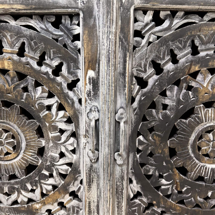 Close-up of the Hardiwar buffet highlighting the detailed circular carving and distressed mango wood finish