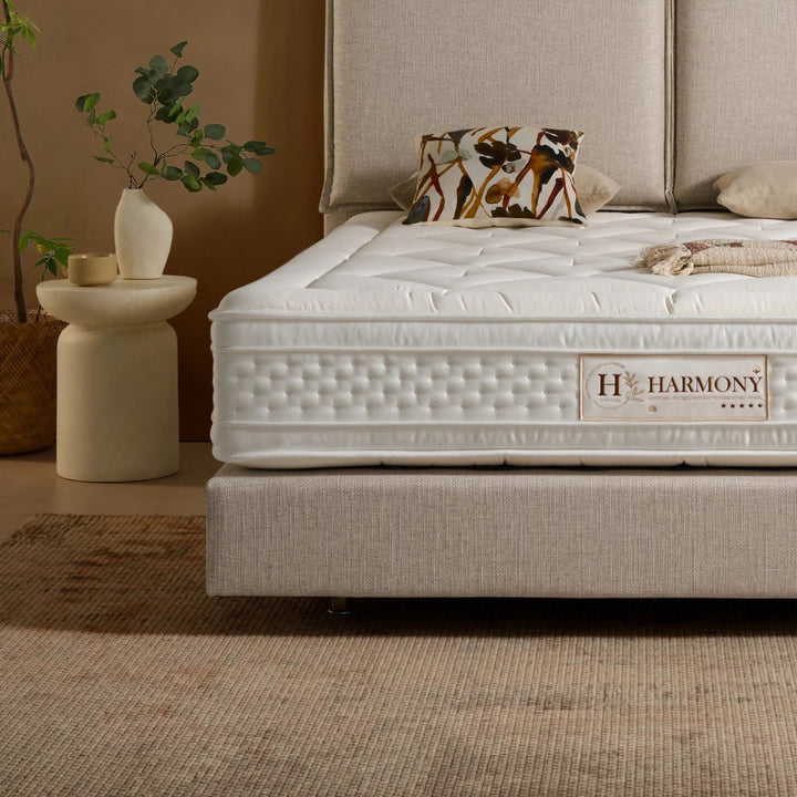 Side view of the Harmony Mattress highlighting its double-sided construction and premium materials.