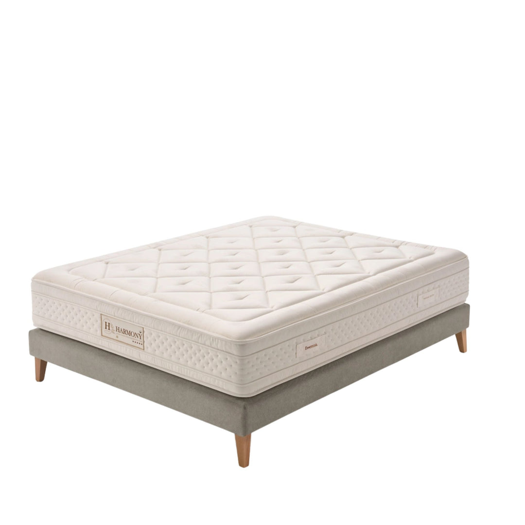 Studio view of the Harmony Mattress displaying its natural ivory quilted top.