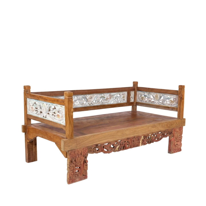 Front view of the Hemera Indonesian carved teak wood daybed showing its reclaimed teak frame and decorative carved details.