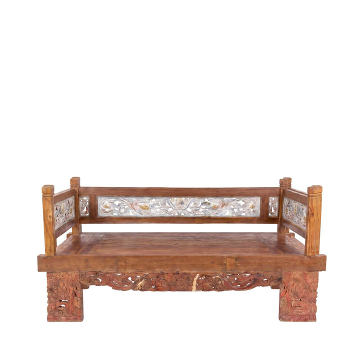 Front view of the daybed highlighting its carved apron, backrest panels, and solid reclaimed teak wood structure.