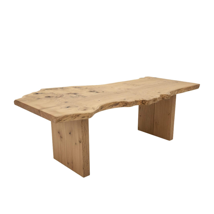 Side angle highlighting the sculptural oak legs and organic tabletop shape.