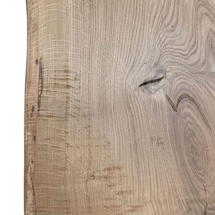Close-up of the oak wood surface displaying natural texture and handcrafted details.