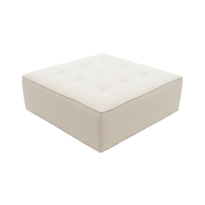 Angled view of a Hera square pouf showing seat and base detail.
